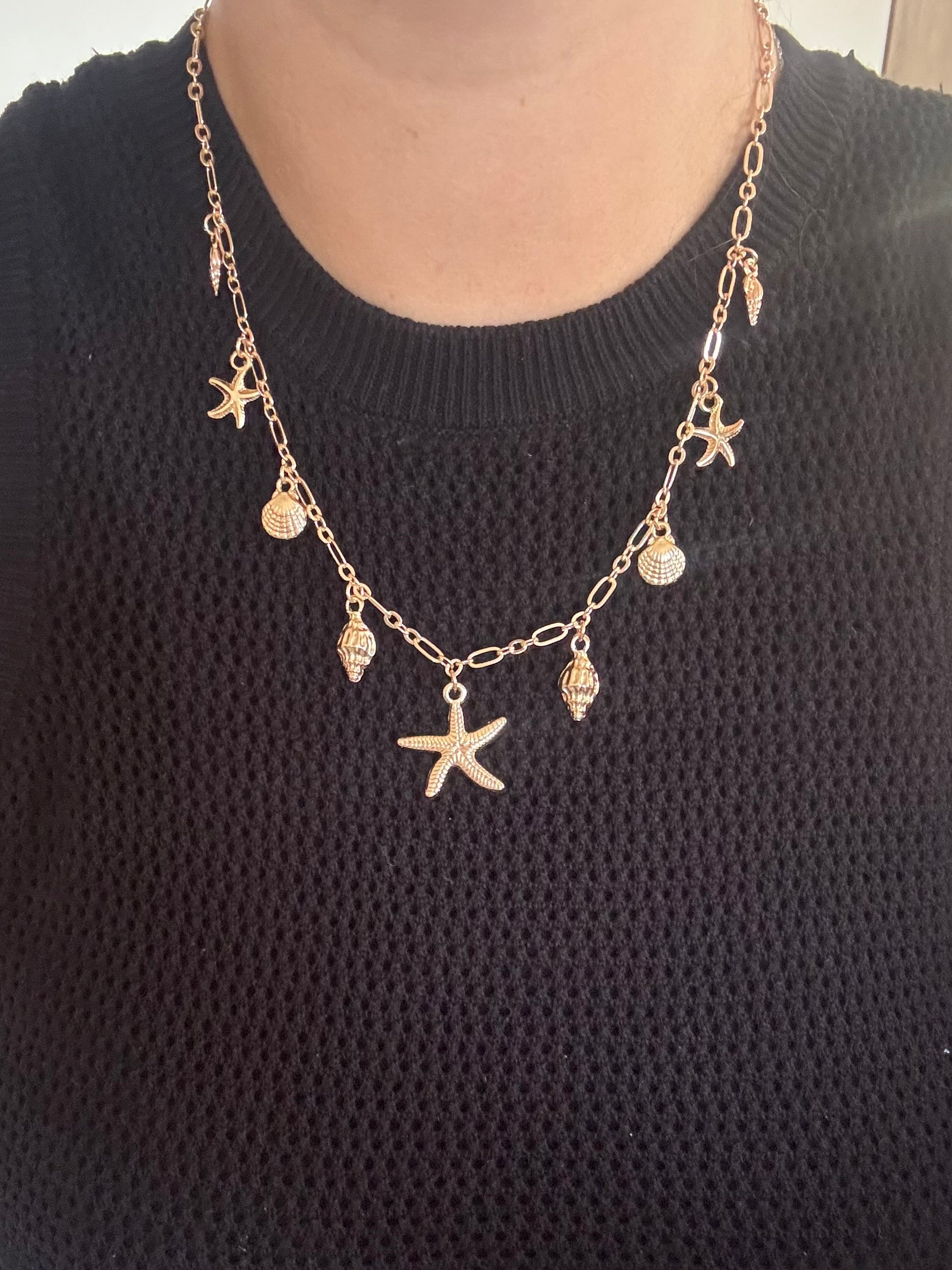 Collier doré coquillage